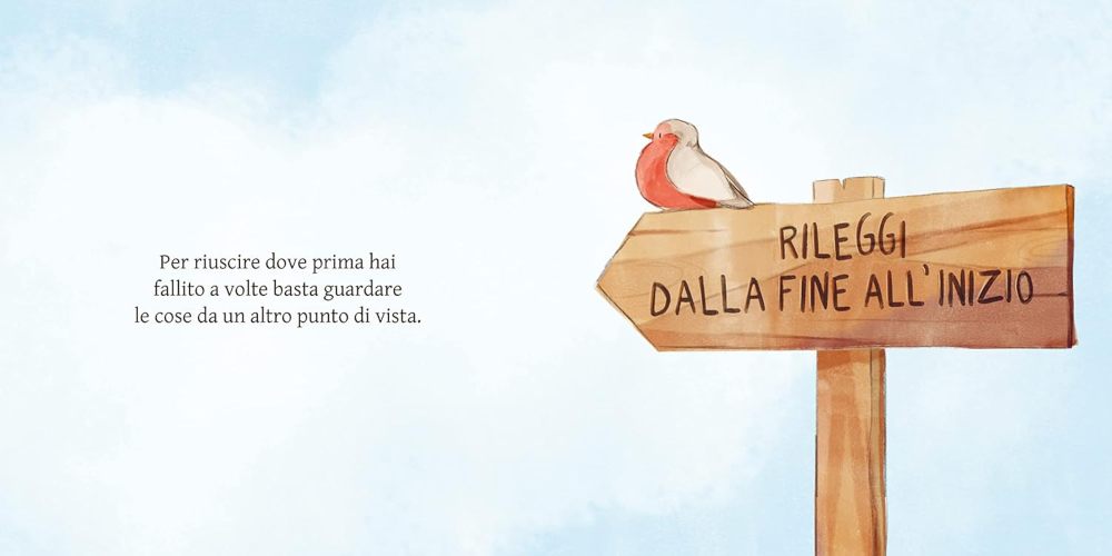 NON IMPARERò MAI A VOLARE: IL PETTIROSSO APPOLLAIATO SU UN SEGNALE DI LEGNO CHE RECITA "RILEGGI DALLA FINE ALL'INIZIO" SULLO SFONDO UN IMMENSO CIELO AZZURRO E LUMINOSO