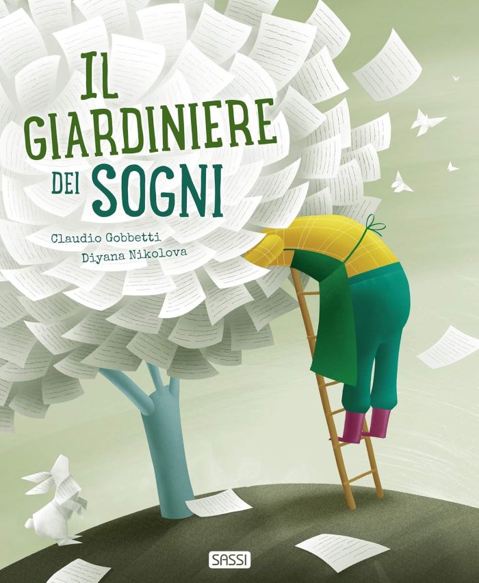 Il giardiniere dei sogno - Un albero di fogli di carata con un omino in maglia gialla e pantaloni versi arrampicato su una scala che raccoglie i fogli